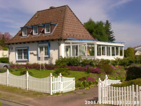 Отель Ferienwohnungen und Ferienhaus im Nixenweg  Ховахт